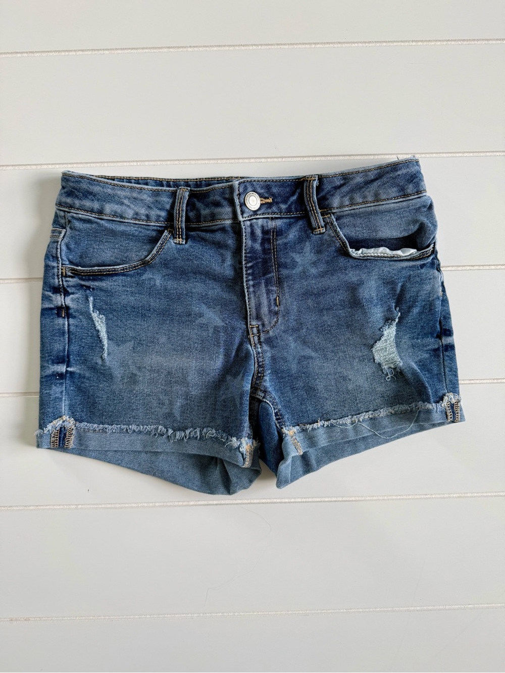 Blue Distressed Denim Shorts with Subtle Stars